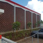 Red Building with Red Roof — Roofing Services in Winnellie, NT