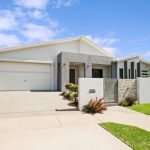 House with White Roof — Roofing Services in Winnellie, NT